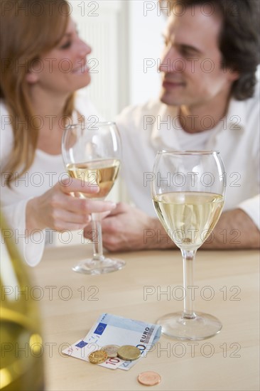 Couple enjoying wine.