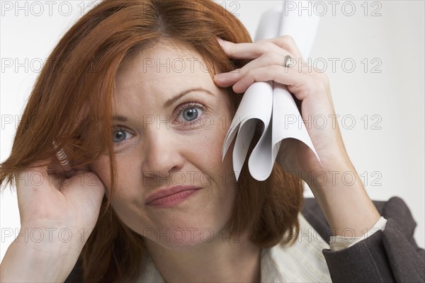 Closeup of exasperated businesswoman.