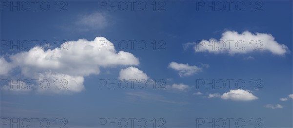 White clouds in blue sky.