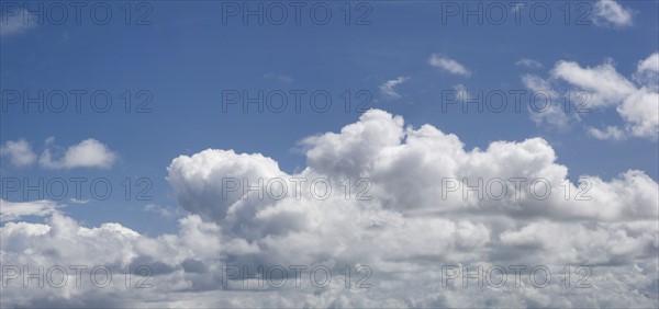 White clouds in blue sky.