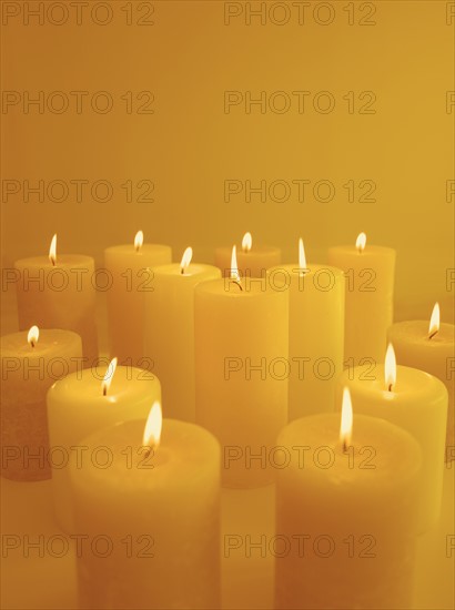 Still life of lighted candles.