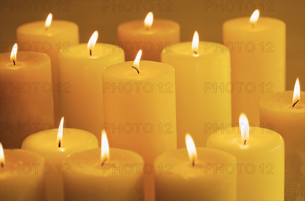 Still life of lighted candles.