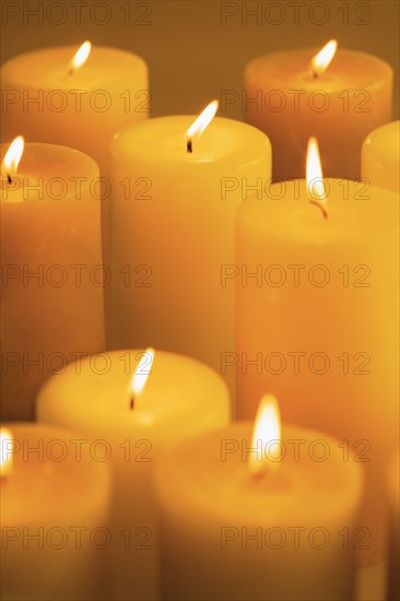 Still life of lighted candles.