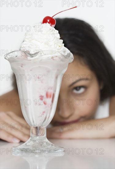 Woman wanting ice cream sundae.