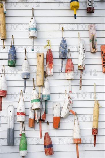 Buoys on a wall in Maine.