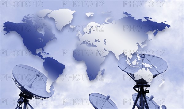 Satellite dishes and world map.