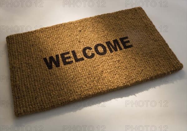 Closeup of a welcome mat.