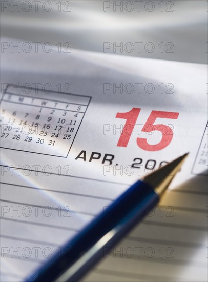 Still life of calendar page of April 15.