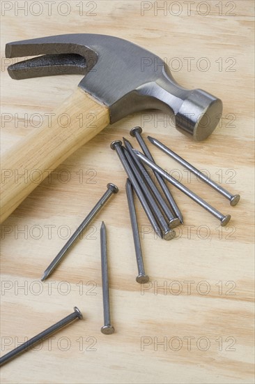 Closeup of hammer and nails.