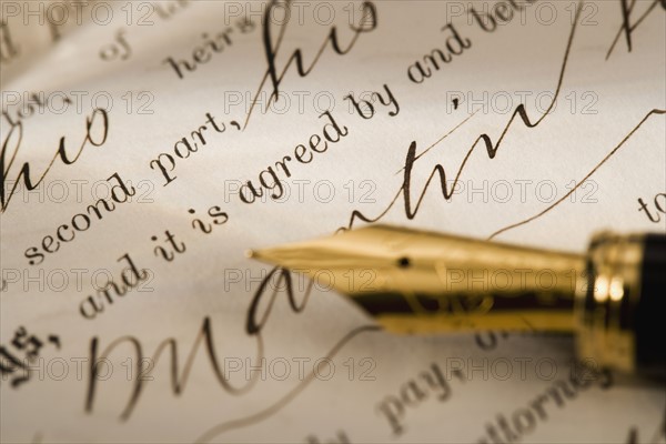 Closeup of pen and contract.