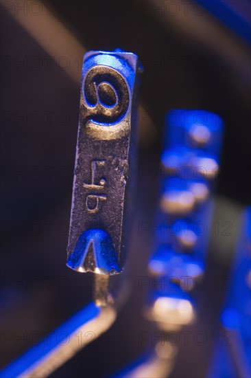 Closeup of typewriter printing plates.