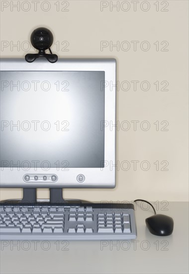 Computer with webcam attachment.