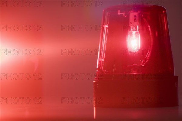 A glowing red emergency light.