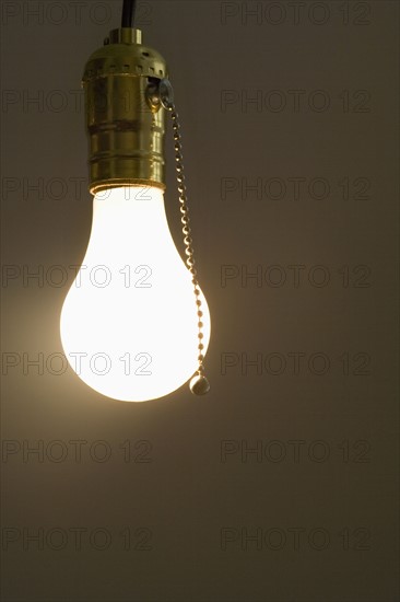 Closeup of bare light bulb.