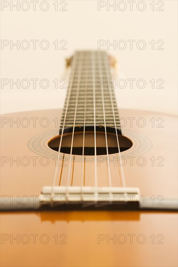 Closeup of acoustic guitar.