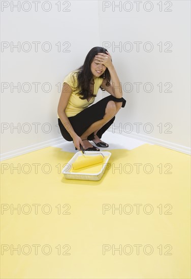 Woman painted into a corner.