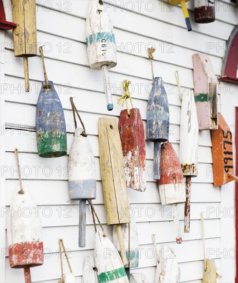 Buoys on a wall in Maine.