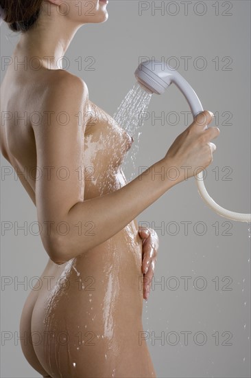 Woman taking a shower.