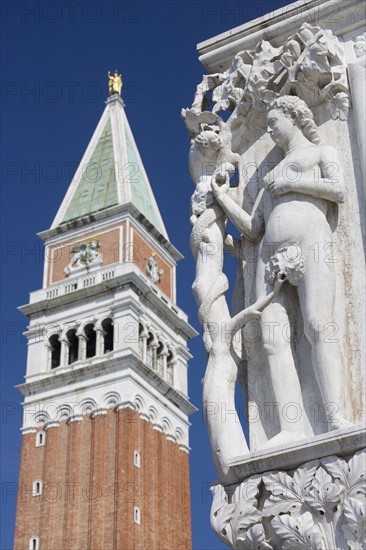 Eve in Garden of Eden Doges' Palace with Campanile at Piazza San Marco Venice Italy.