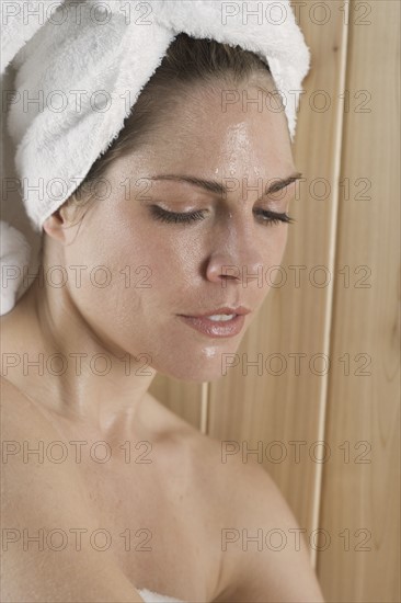 Closeup of woman in sauna.