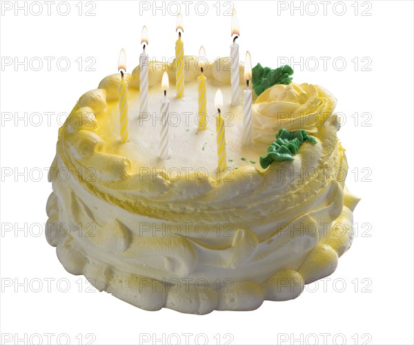 Cake with lit candles.