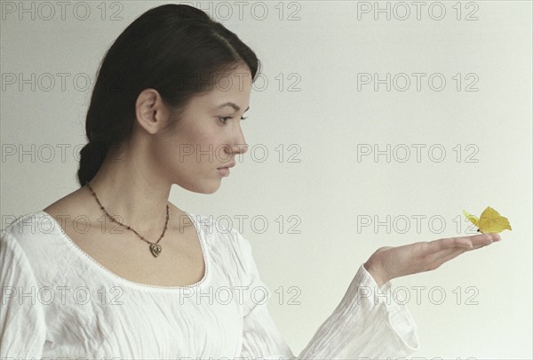 Woman with butterfly.