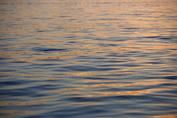 Subtle sunshine on water.