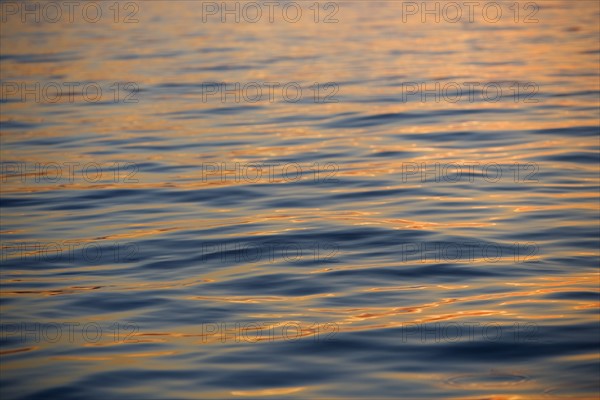 Subtle sunshine on water.