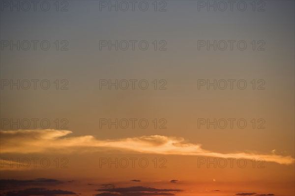 Thin band of clouds.