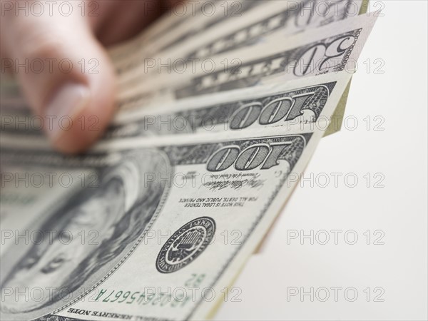 Closeup of hand with American cash.