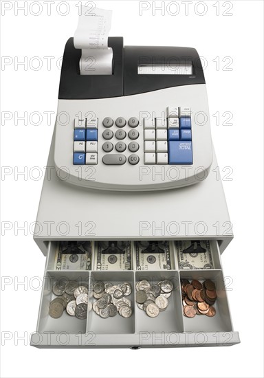 Cash register with money.