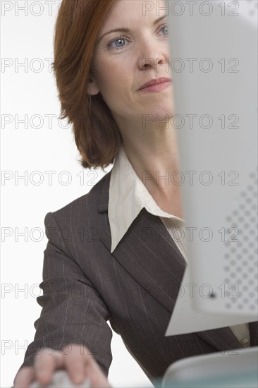 Businesswoman working on computer.