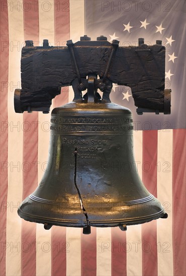 Liberty Bell and American flag with thirteen stars.