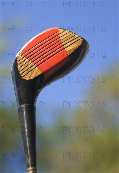 Closeup of a golf club.