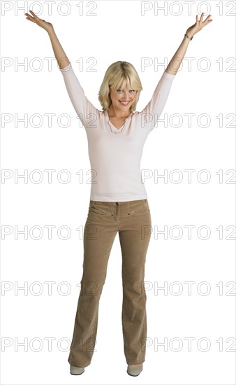 Woman gesturing with arms outstretched.