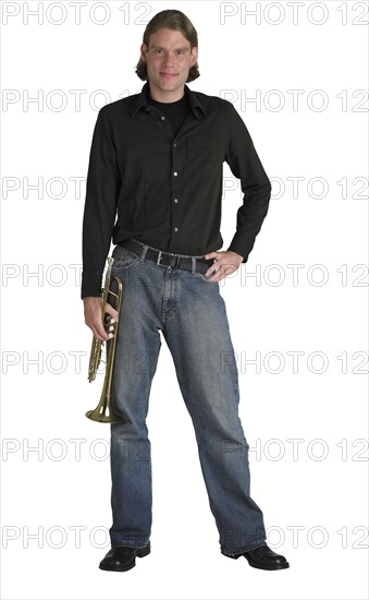 Man standing with horn.