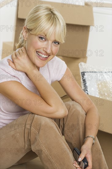 Portrait of woman on moving day.