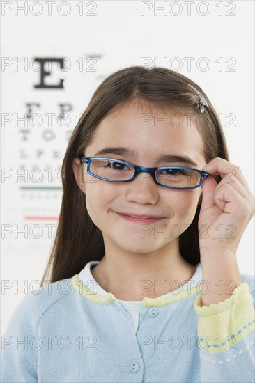 Portrait of girl wearing glasses.