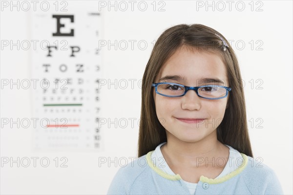 Portrait of girl wearing glasses.