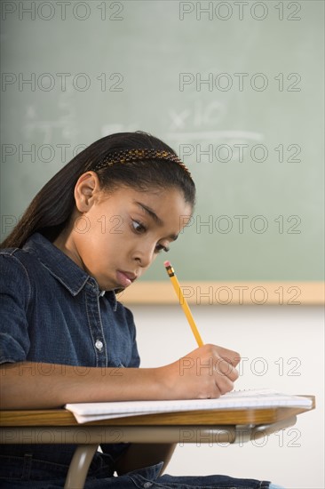 Young girl in classroom.