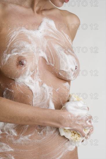 Closeup of woman bathing.