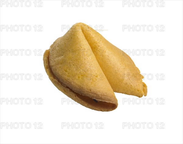 Closeup of a single fortune cookie.