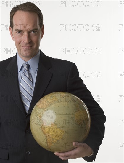 Man holding globe.