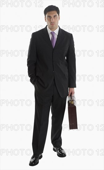 Businessman holding briefcase.