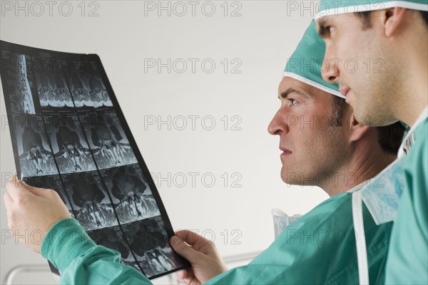 Doctors looking at x-rays.