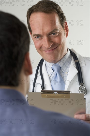 Doctor meeting with patient.
