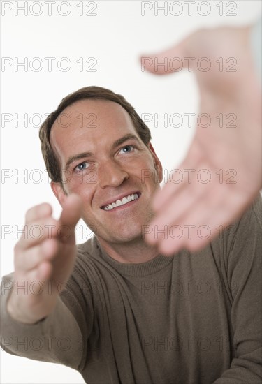 Two men shaking hands.