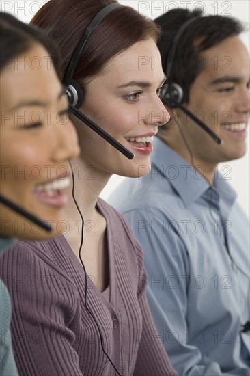 Phone operators using headsets.