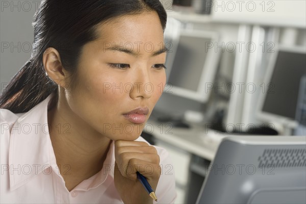 Businesswoman working at computer.