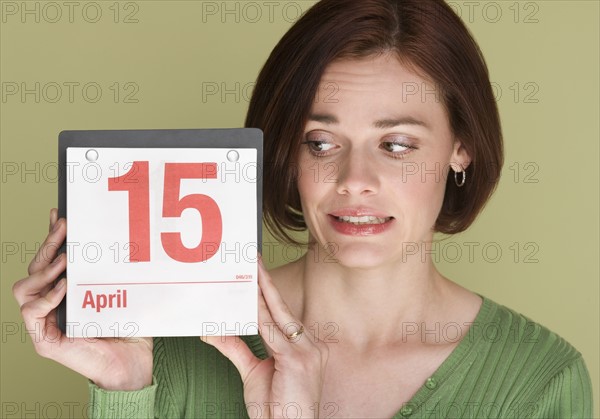 Woman worried about tax deadline.